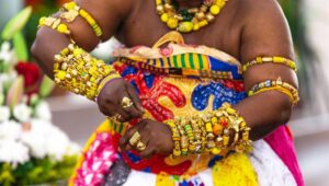 A Ghanaian woman traditional dancer dressed in Krobo beads accessories 
