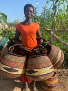 A lady with her bolga baskets